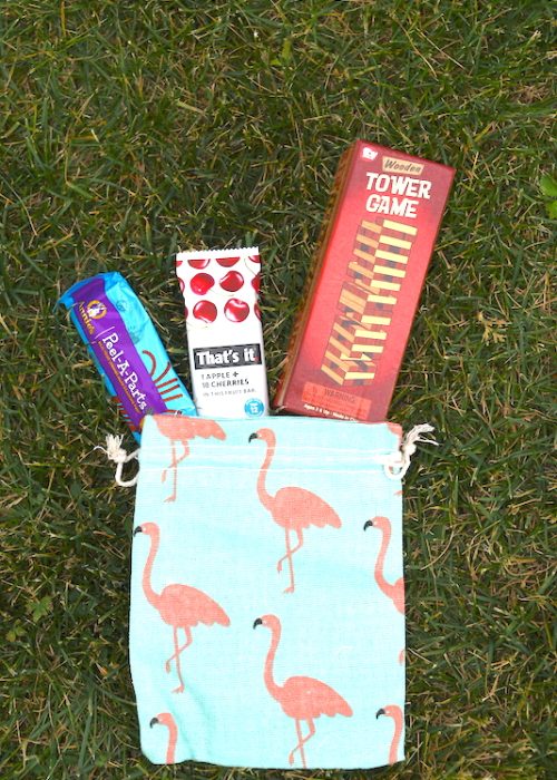flamingo purse with products coming out